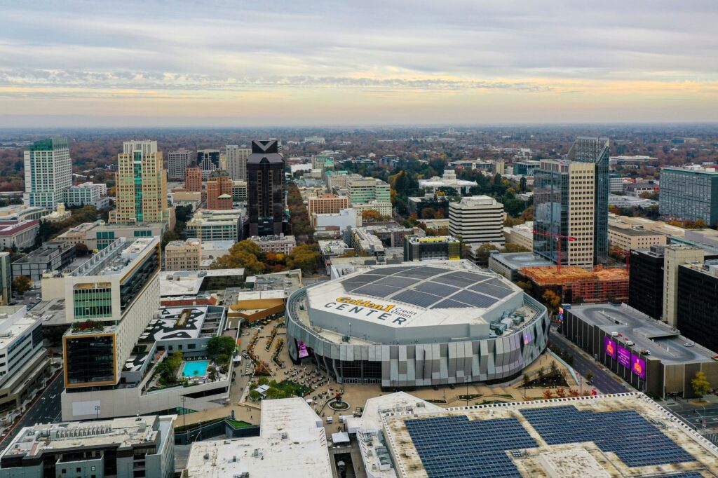 Aerial view of Sacramento's skyline featuring the Golden 1 Center, showcasing modern architecture.
