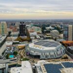 Aerial view of Sacramento's skyline featuring the Golden 1 Center, showcasing modern architecture.