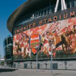 Exterior view of the iconic Emirates Stadium, home of Arsenal FC in London, England.