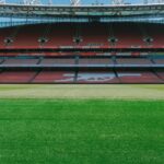 A view of the empty stands and football pitch at Emirates Stadium, London.