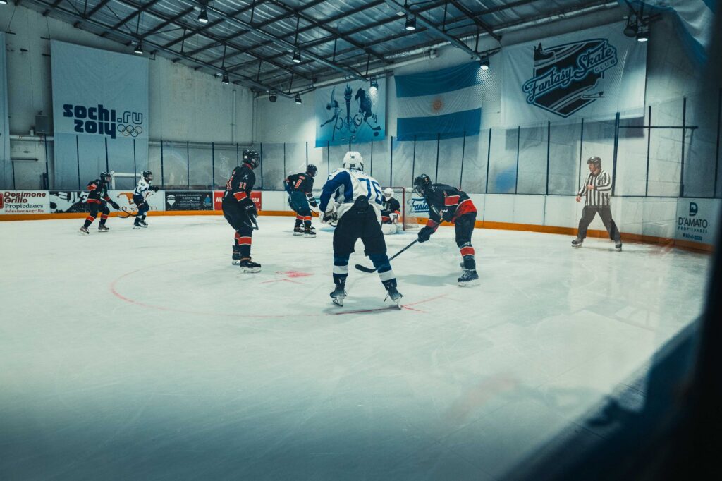 Competitive ice hockey game at Fantasy Skate Club in Buenos Aires, showcasing intense sports action on the rink.