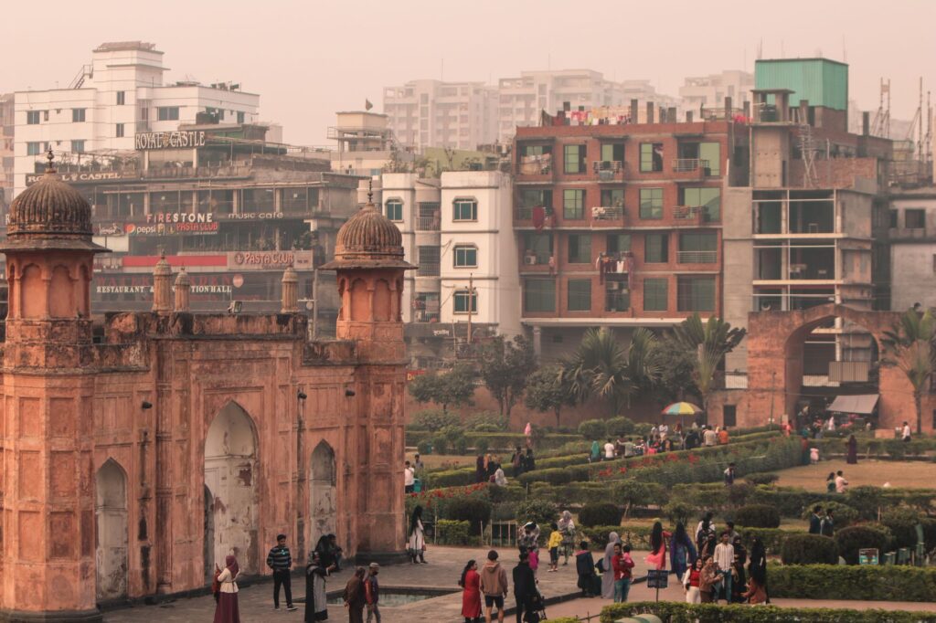 Explore Lalbagh Fort amidst the bustling cityscape of Dhaka, a blend of history and urban life.