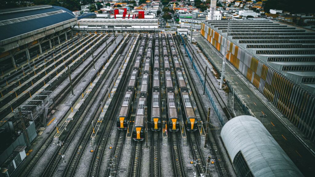Aerial view of a train yard with multiple trains in São Paulo, Brazil.