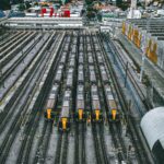 Aerial view of a train yard with multiple trains in São Paulo, Brazil.