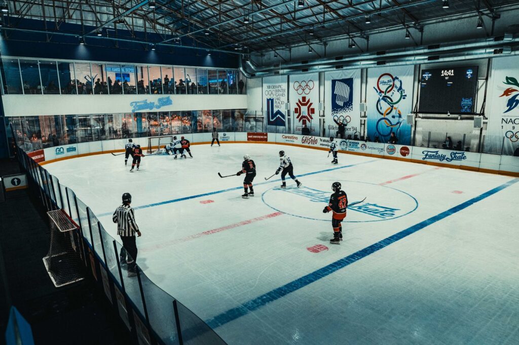 Indoor ice hockey game in Buenos Aires showcasing players in action with vibrant arena ambiance.