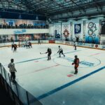 Indoor ice hockey game in Buenos Aires showcasing players in action with vibrant arena ambiance.