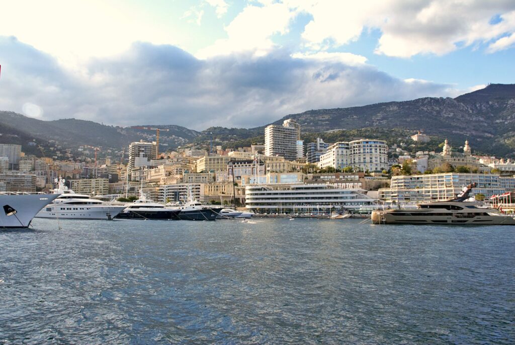 Explore the breathtaking skyline and luxury yachts at Monaco's picturesque harbor.