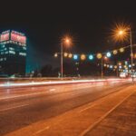 Vibrant night scene showing light trails on a street in Podgorica, Montenegro.