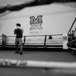 A boxer practicing alone in an indoor boxing gym in Buenos Aires, Argentina.