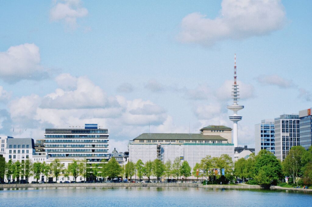 A scenic view of Hamburg's skyline featuring the iconic Heinrich-Hertz Tower.