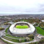 Aerial view of MKM Stadium in Hull, England, bustling with fans on match day.