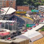 Aerial view of Monaco Grand Prix circuit with spectators and iconic track details.