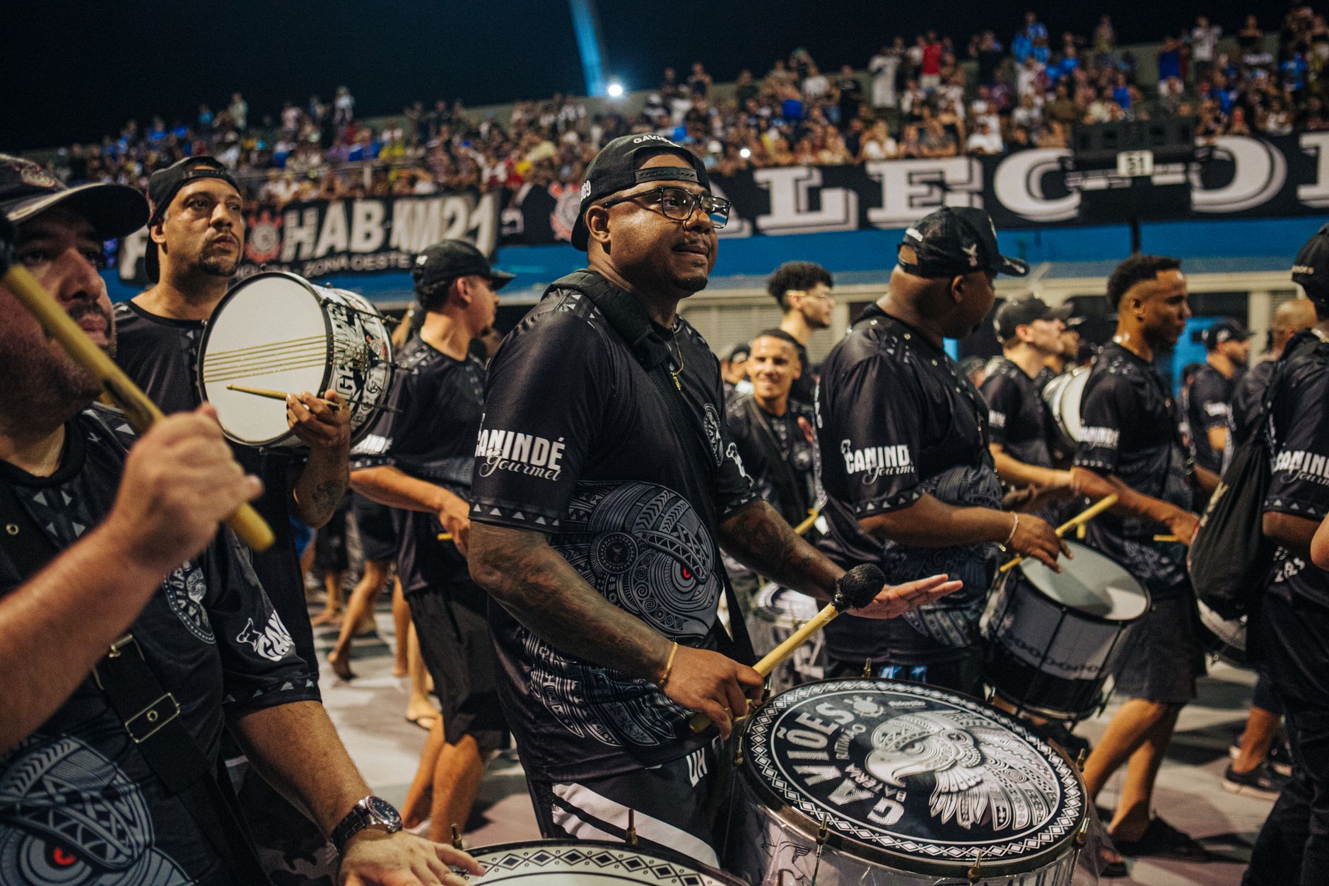 Exciting drum band performance during a vibrant carnival in São Paulo, Brazil, capturing cultural celebration.