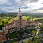 Discover the luxury Biltmore Hotel in Miami with lush golf course panorama.