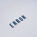 Simple and minimalist image showcasing the word 'ERROR' on a white background.