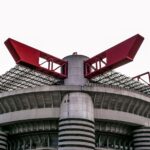 Close-up view of the iconic San Siro Stadium in Milan, showcasing its unique architecture.