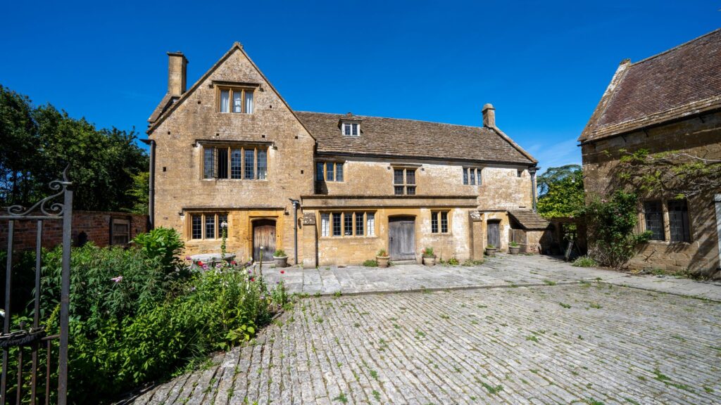 Charming historic stone building with garden in Somerset, UK.