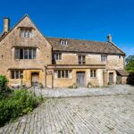 Charming historic stone building with garden in Somerset, UK.