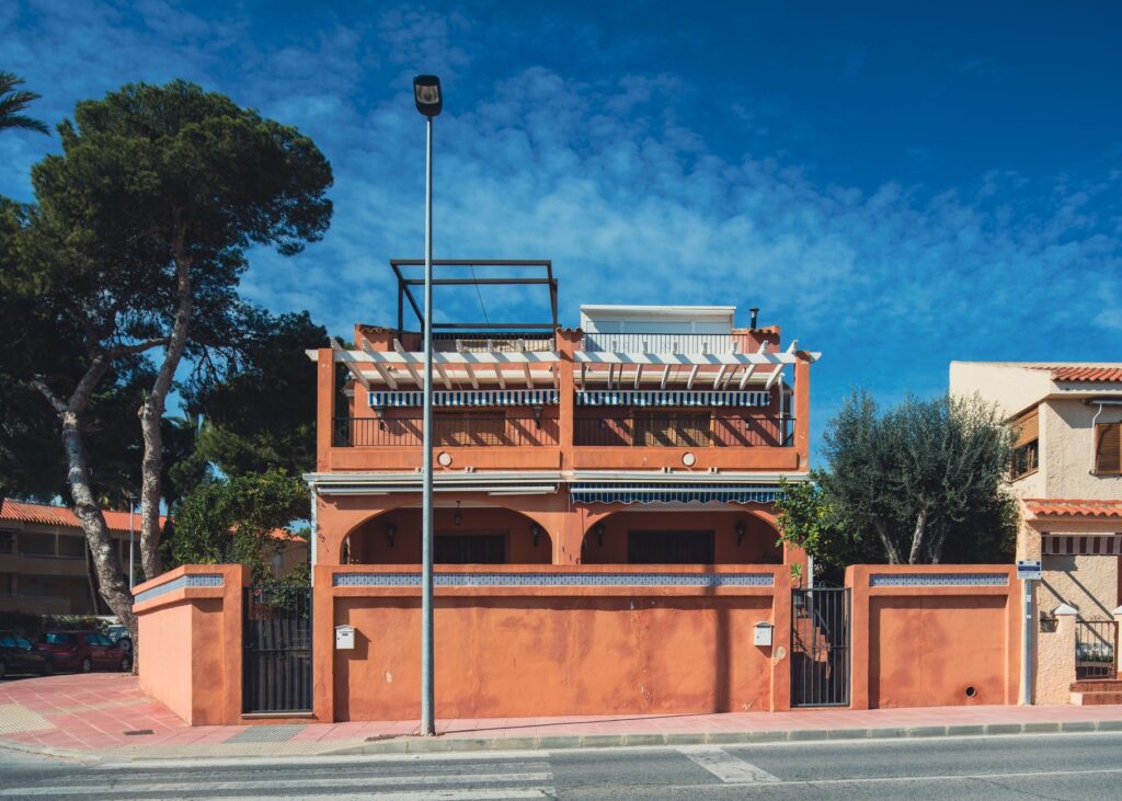 A picturesque villa in San Javier, Spain, showcasing classic Spanish architecture on a sunny day.