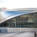 Explore the sleek design of the NASCAR Hall of Fame, showcasing modern architecture.