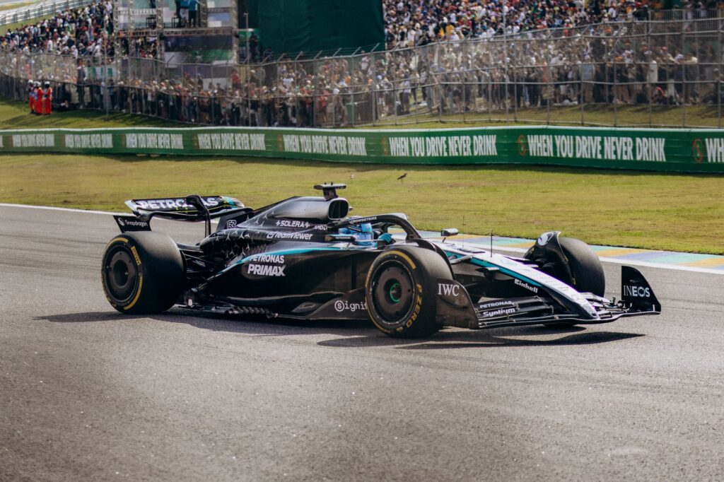 Formula 1 car in high-speed action at Interlagos, São Paulo, Brazil.