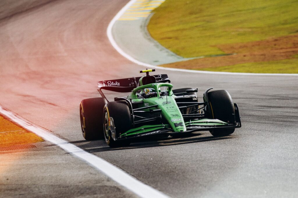 Capture of a Formula 1 car speeding on Interlagos racetrack in São Paulo, showcasing high-speed motorsport excitement.