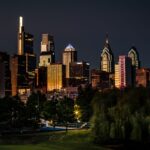 Stunning view of Philadelphia's skyline illuminated at night, showcasing iconic skyscrapers and urban beauty.