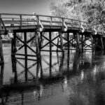 Black and white photo of the iconic Old North Bridge in Concord, Massachusetts.