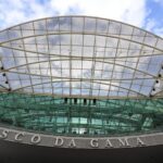 Explore the sleek modern architecture of Vasco da Gama, Lisbon, highlighting its contemporary structure.