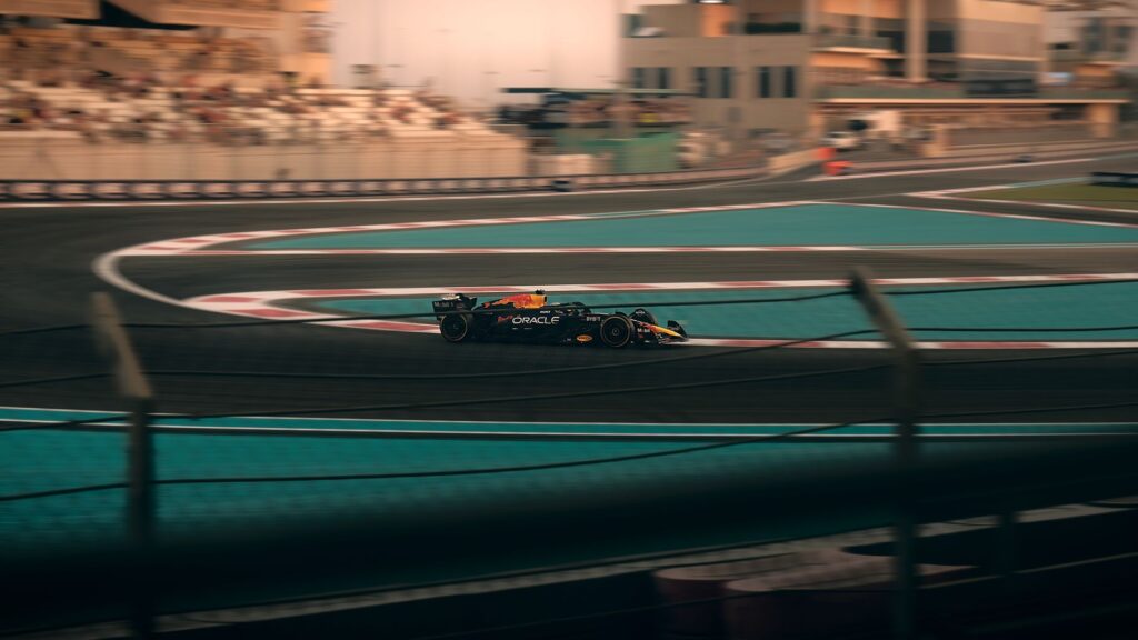 Exciting Formula 1 car racing on the Yas Marina Circuit, Abu Dhabi.
