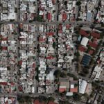 High-resolution aerial view showcasing urban housing blocks in Aguascalientes, Mexico.