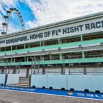Empty Singapore Grand Prix F1 circuit during the day, showcasing race track and Singapore Flyer.
