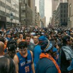 Thriving street celebration with a diverse crowd in New York, showcasing excitement and unity.