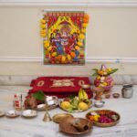A vibrant Hindu worship setup for Ganesh Puja featuring offerings and decorative elements, symbolizing tradition and spirituality.