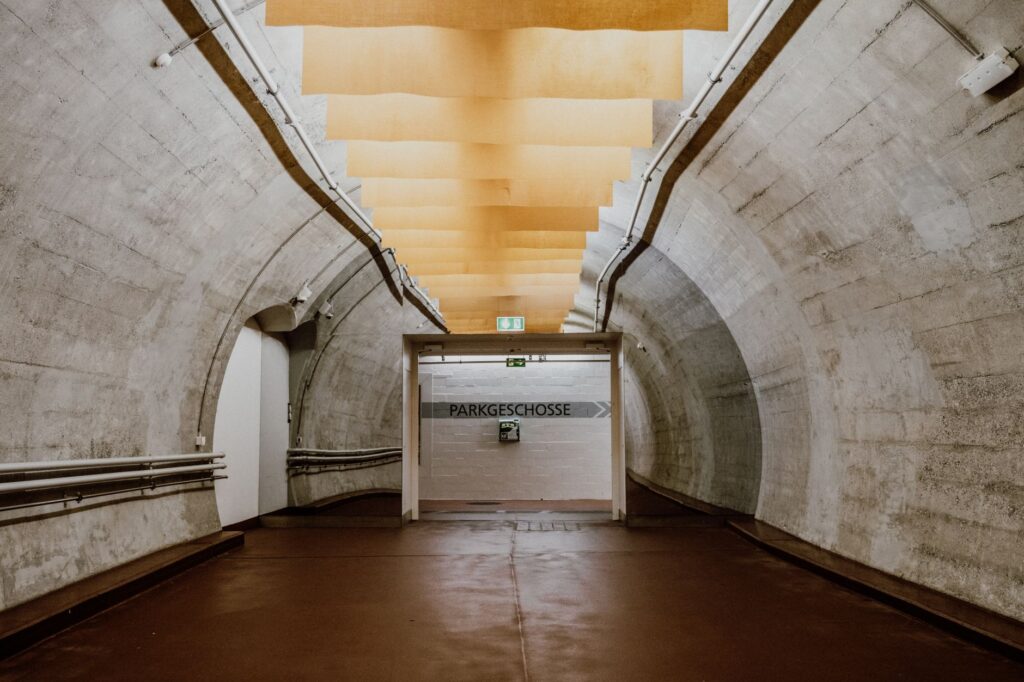 Concrete underground passage with modern lighting in Zurich, Switzerland.